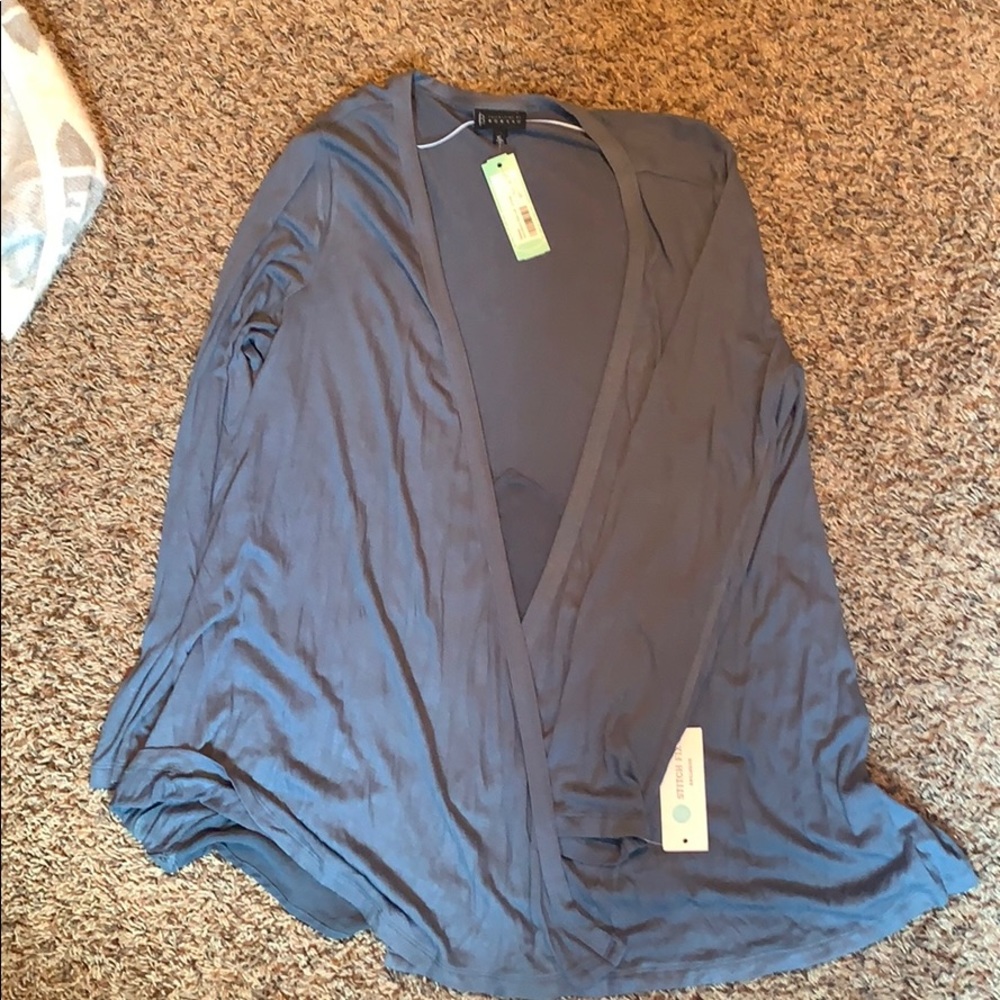Blue cardigan with a mesh triangular back